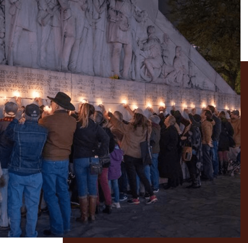 people at the Alamo Mission in San Antonio at Night